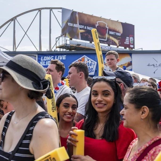 Patrick Bertoletti of Chicago wins his first men’s title at annual Nathan’s hot dog eating contest.